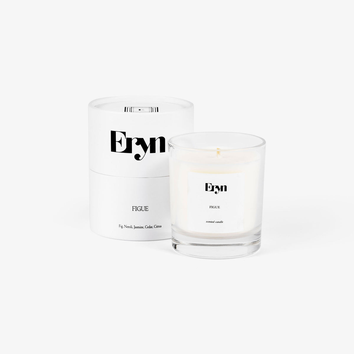 Image of an Eryn candle in the scent FIGUE alongside it's packaging