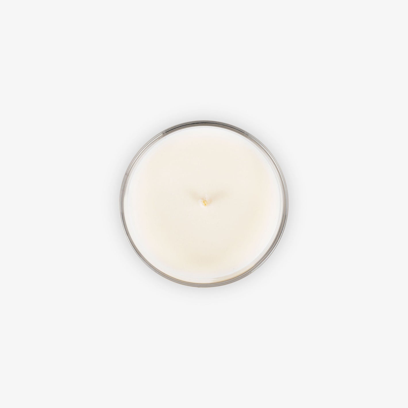 Image of a clean burning, low-tox scented candle from above showcasing the 100% cotton wick free from any lead.
