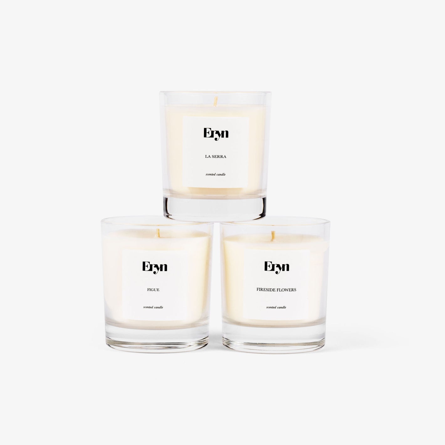 Image of three Eryn candles stacked together on grey background 