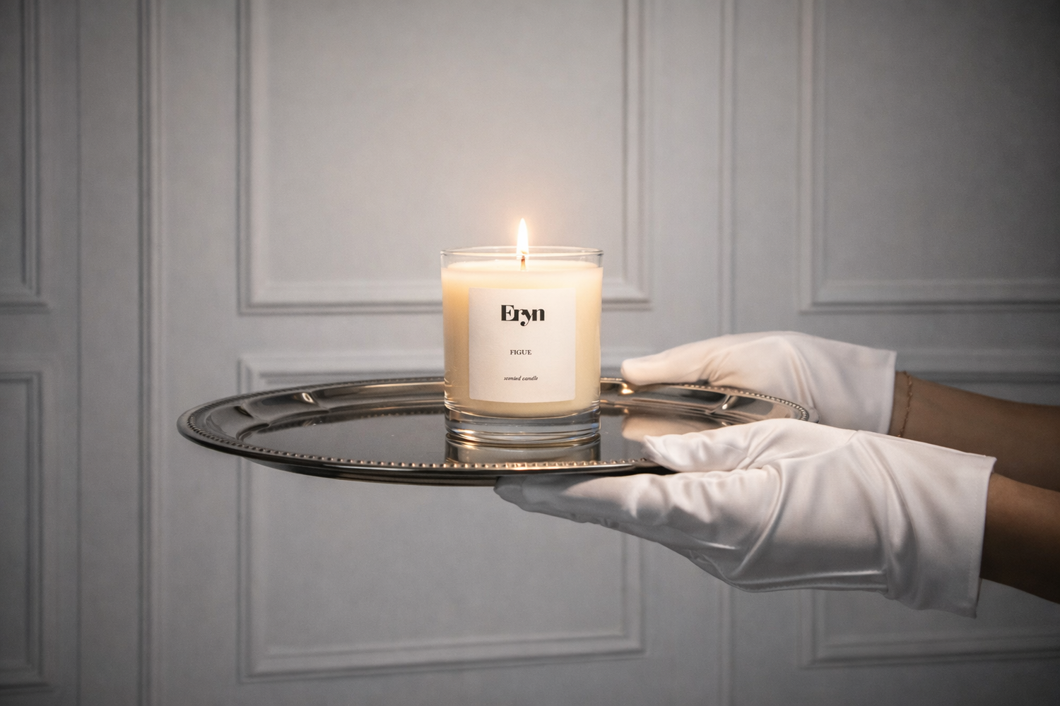 Figue luxury candle by Eryn in glass vessel on vintage silver tray