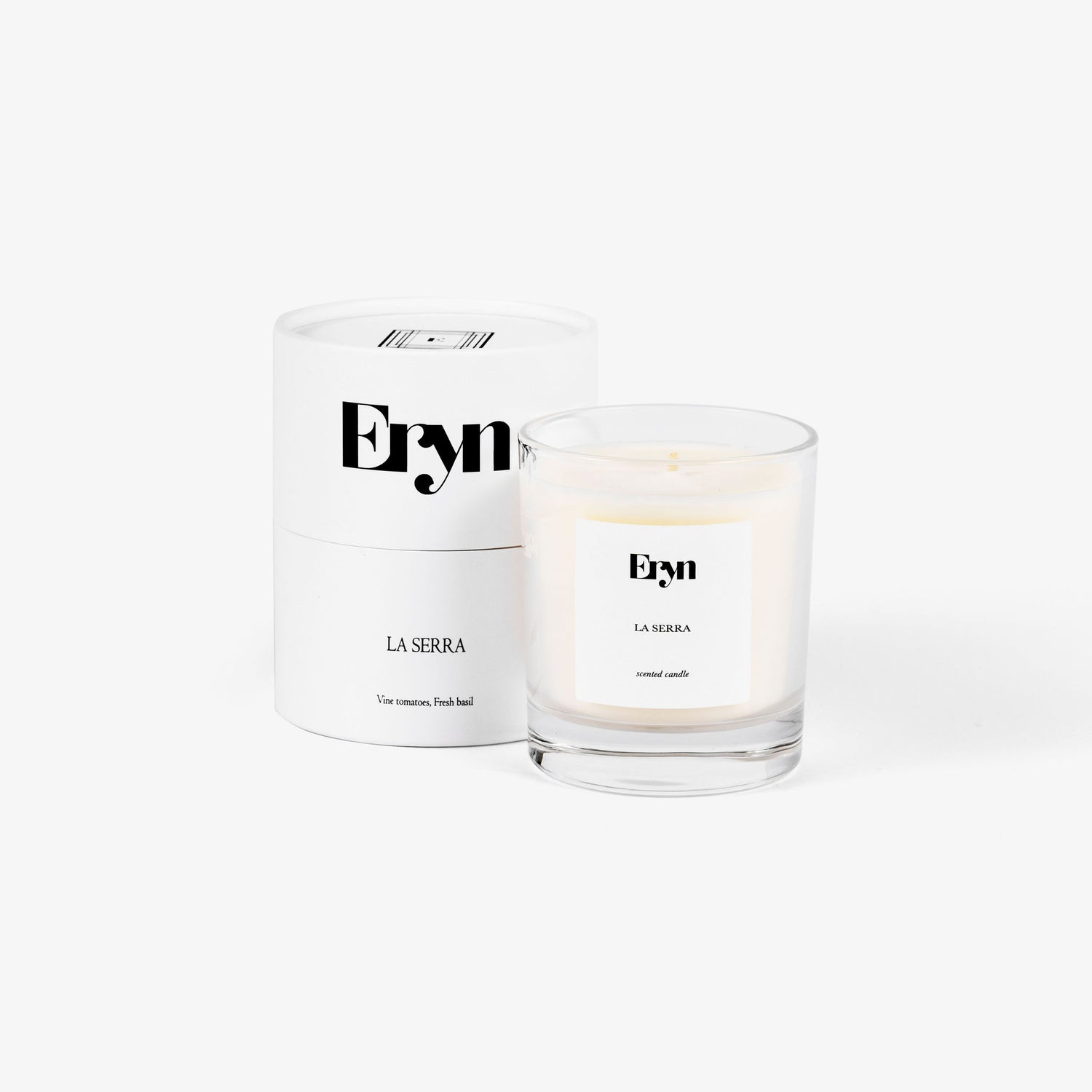 Image of the scented candle LA SERRA by Eryn on light grey background 